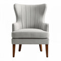 Upholstered wingback accent chair in light gray fabric with wooden legs